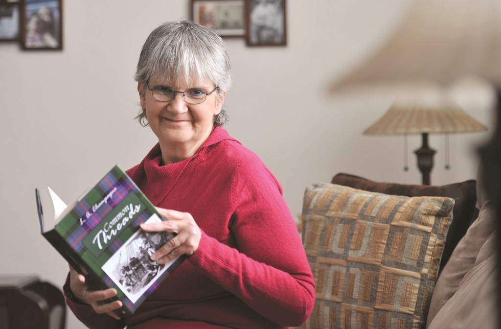Mark Wanzel The Barrie Examiner QMI Local author Lorri -Ann Champagne with her new book, Common Threads.