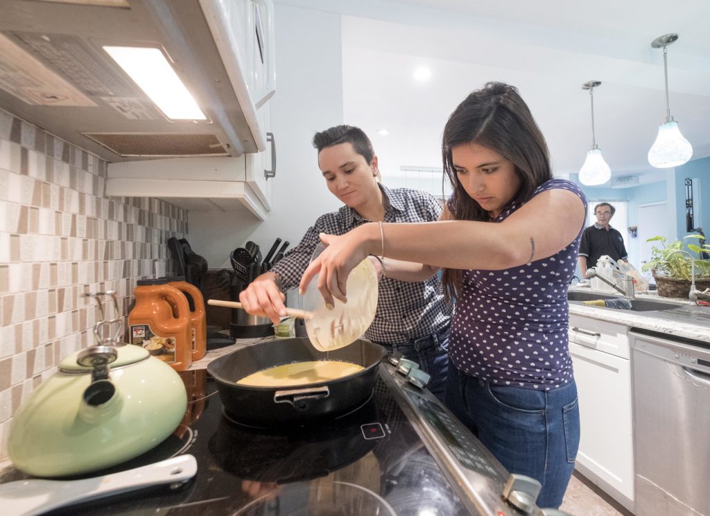 Aurora and Johanna making scrambled eggs