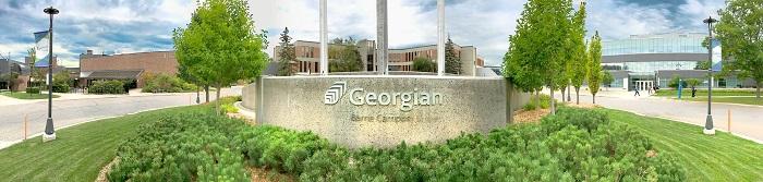 Shot of Barrie Campus outside - Georgian College Cenotaph/main entrance C building