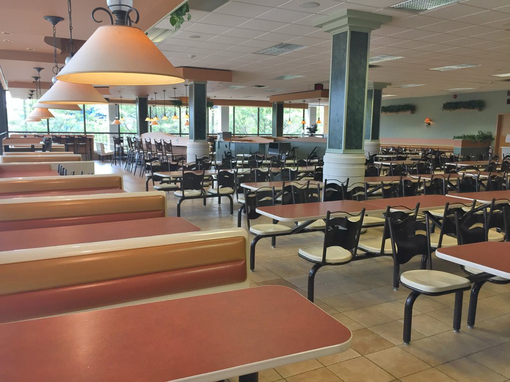 Marketplace cafeteria with fixed seating and booths