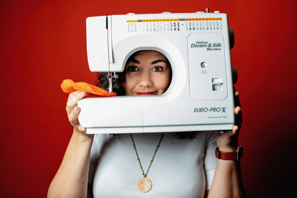 Laura Koza with sewing machine