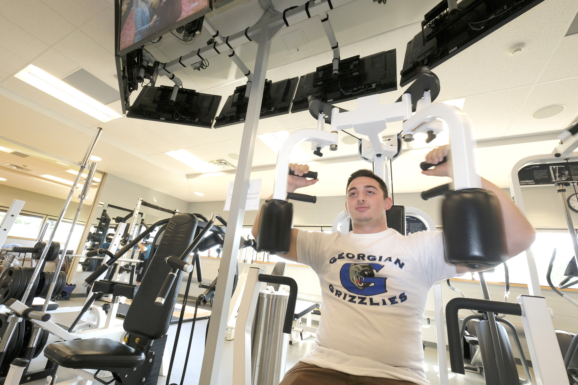 Male student working out in the Orillia Fitness Centre