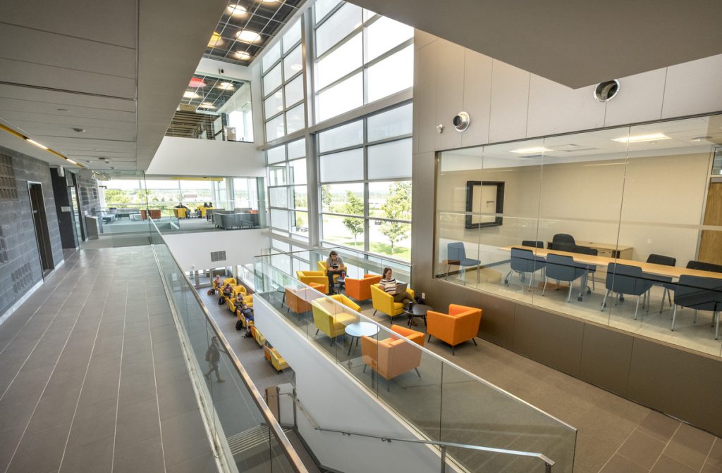 The second floor of the Advanced Technology Centre, showing a meeting room, a lounge area, a staircase and a hallway