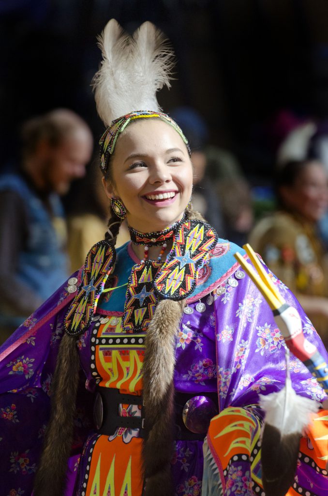 Female at Pow Wow in traditional clothing