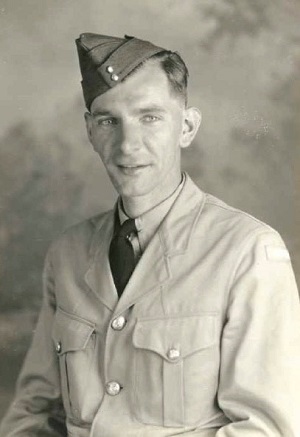 Black and white photo of solider in uniform