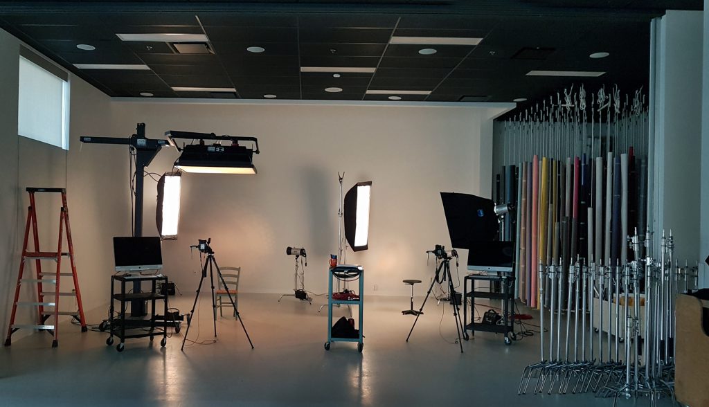 the photography studio at Georgian's downtown location, featuring computer, camera, lighting and backdrop equipment