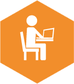 icon of a person sitting at a desk using a laptop