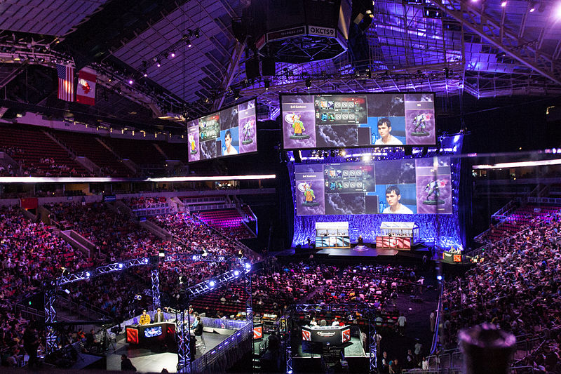 Image of an eSports competition held in a physical arena.