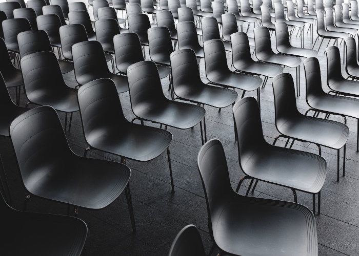 a photo of empty chairs at an event
