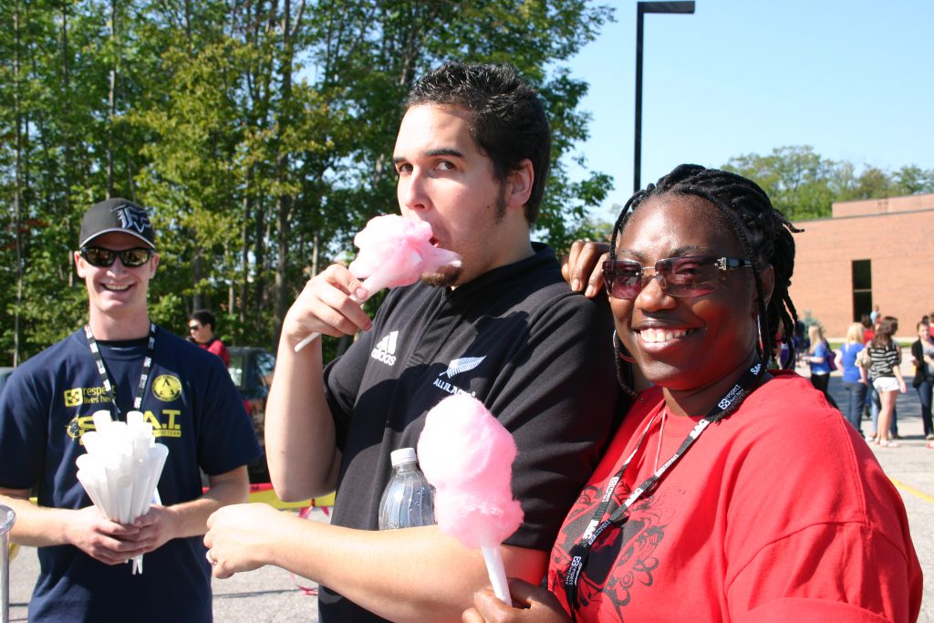 Students eating candy floss at Orientation