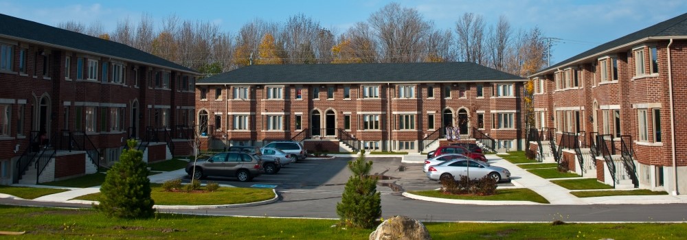 Exterior of the Owen Sound Residence buildings and parking lot