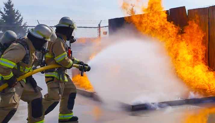 Marine students training to fight fire with real fire