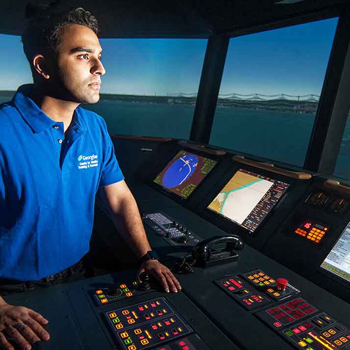 Marine student in commercial ship training simulator