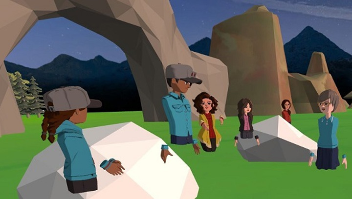 Student avatars meeting in virtual reality space; green grass, rocks and bolders